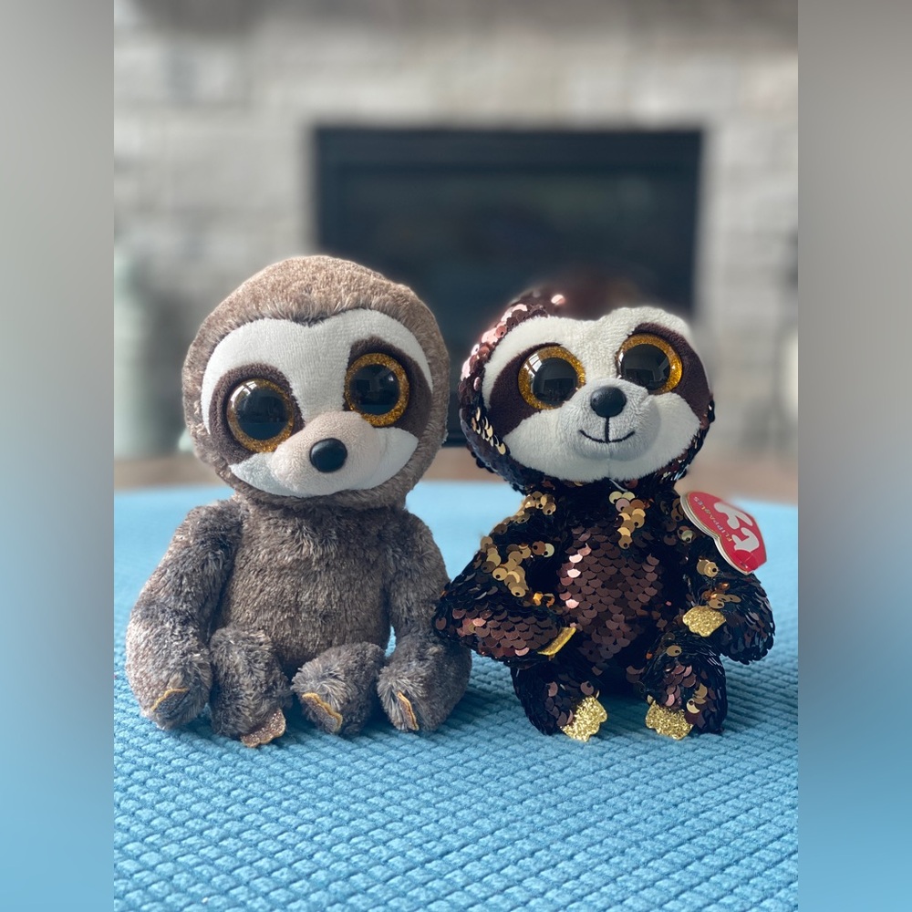 Ty Beanie boo Sloth Dangler, one regular one flip sequins.
